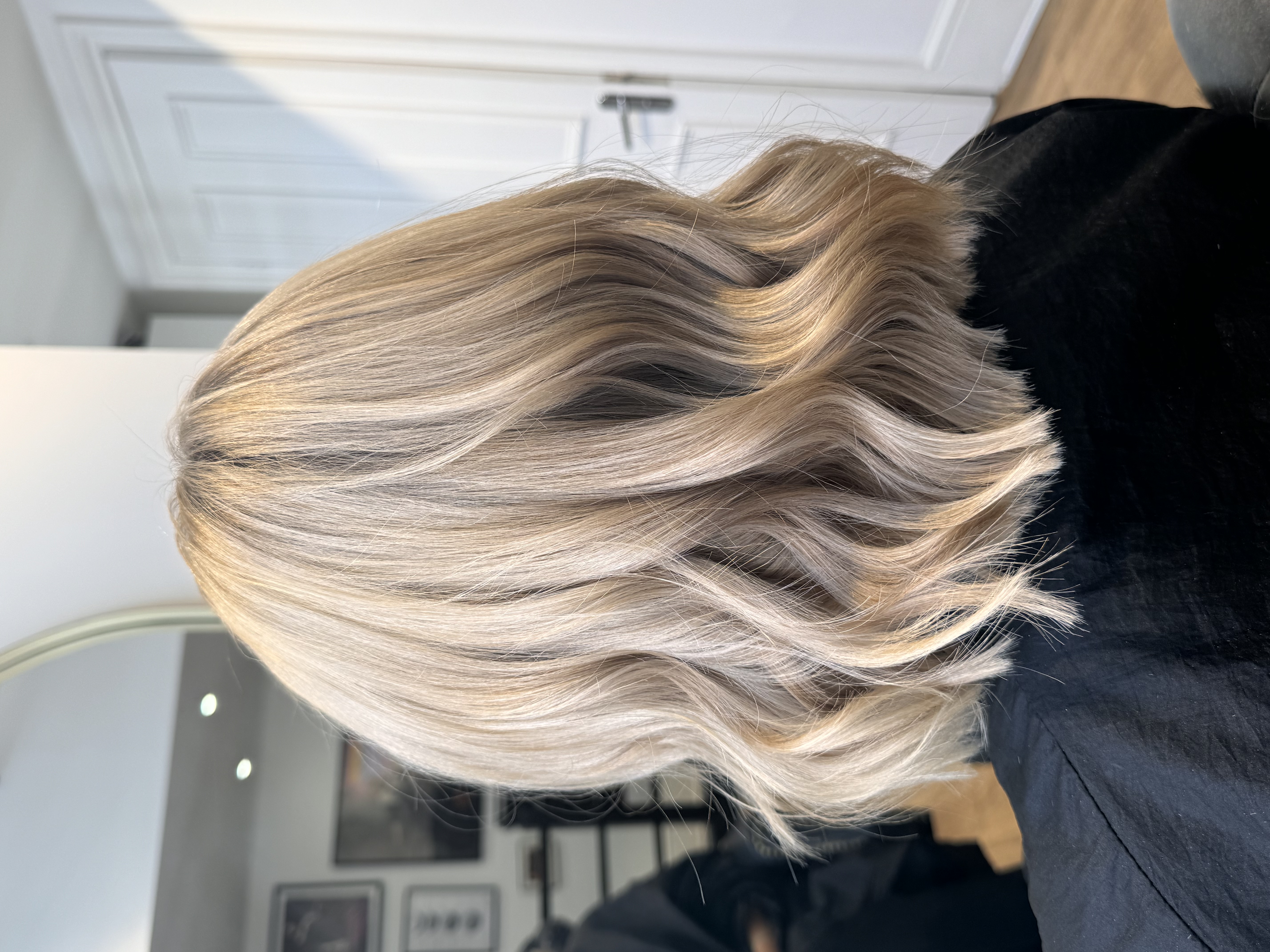 Sandy blonde waves top view